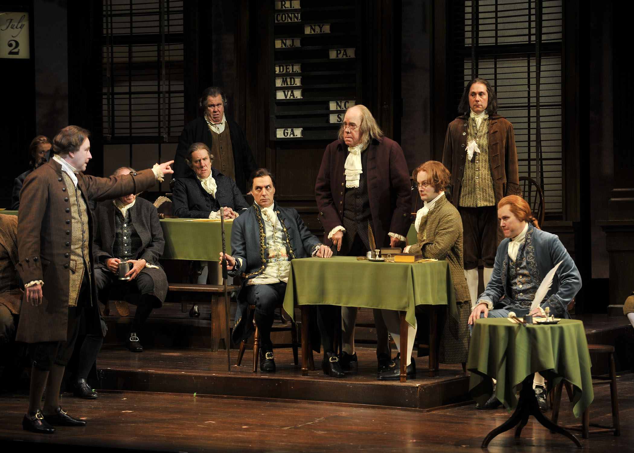 1776 at Paper Mill Playhouse, Photo by Kevin Sprague, from left to right: Don Stephenson (John Adams), Robert Cuccioli (John Dickinson), Conrad John Schuck (Benjamin Franklin), Kevin Earley (Thomas Jefferson), and the Cast.